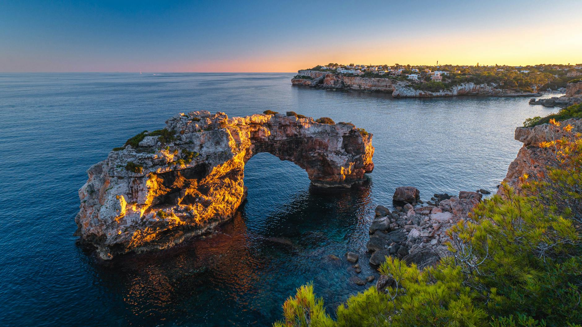 Jagged limestone paths overlooking the sea in Santanyi